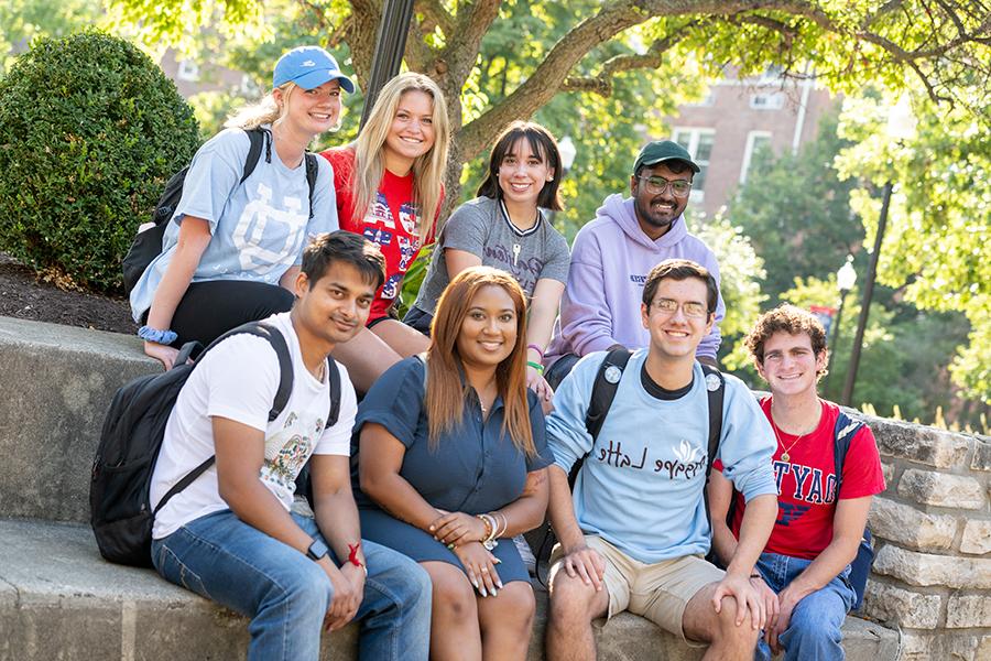 ${ Group of students outside on campus }